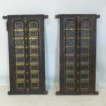 A pair of Anglo Indian carved hardwood window panels, 96 x 53cm