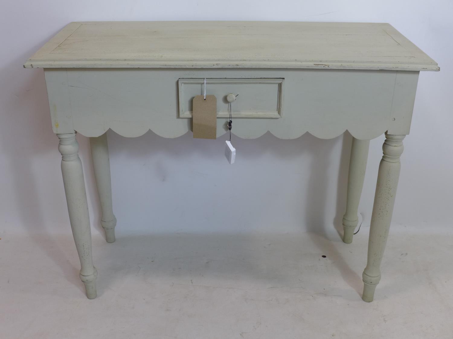A 20th century painted side table, H.78 W.100 D.45cm