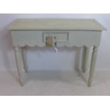 A 20th century painted side table, H.78 W.100 D.45cm