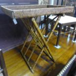 A wicker tray on folding bamboo stand, H.68 W.60 D.40cm