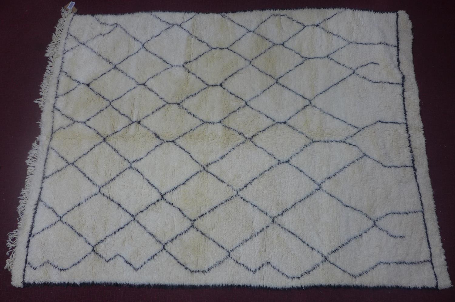 A Moroccan Berber Beni Ourain carpet, with diamond design, 277 x 196cm