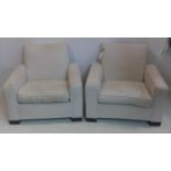 A pair of 20th century armchairs with stone linen upholstery