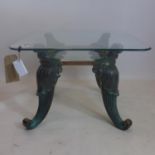 A contemporary bronze and glass coffee table, H.42 W.60 D.60cm
