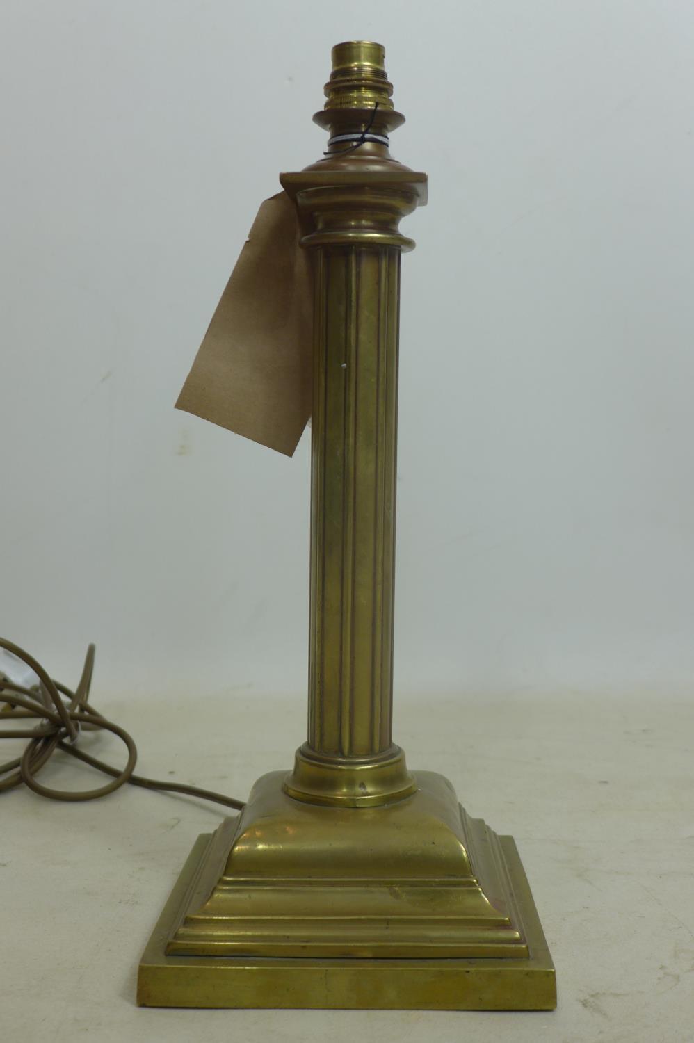 A 19th century, brass column table lamp on squared plinth base, 41.5cm