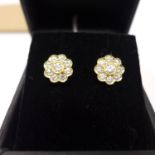 A boxed pair of 18ct yellow gold, brilliant-cut diamond flower-head cluster stud earrings, Dia: 8mm,