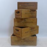 A set of 5 graduating wooden boxes, marked Moet & Chandon, H.14 WW.36 D.23cm (largest) (5)