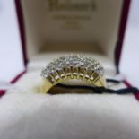 A boxed 14ct yellow gold ring set centrally with 5 rows of round, brilliant-cut diamonds, size: M