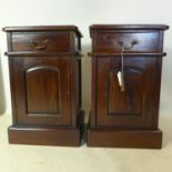A pair of Victorian style mahogany bedside cupboards, H.65 W.40 D.39cm