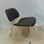 An Eames LCM padded chair, Vitra serial no. to underside, raised on splayed legs, H.65cm