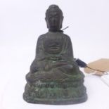 A Chinese cast bronze study of a seated Buddha, H.12cm