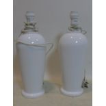 A pair of white pottery table lamps, H.40cm