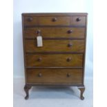 An early 20th century mahogany chest of 3 short over 4 long drawers, raised on cabriole legs, H.