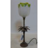 A contemporary bronzed table lamp in the form of a palm tree, with glass shade, H.51cm