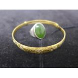 A boxed sterling silver ring set with a polished green jade cabochon ring, Size: I 1/2, 7.2g with