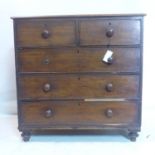 A 19th century mahogany chest of drawers, raised on bun feet, H.105 W.106 D.48cm