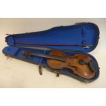 A late 19th/early 20th century violin, with bow and carry case