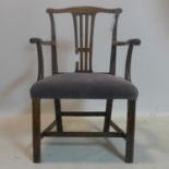 A Georgian oak armchair