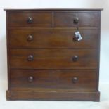 A 19th century mahogany chest of drawers, raised on stepped base, H.103 W.106 D.50cm