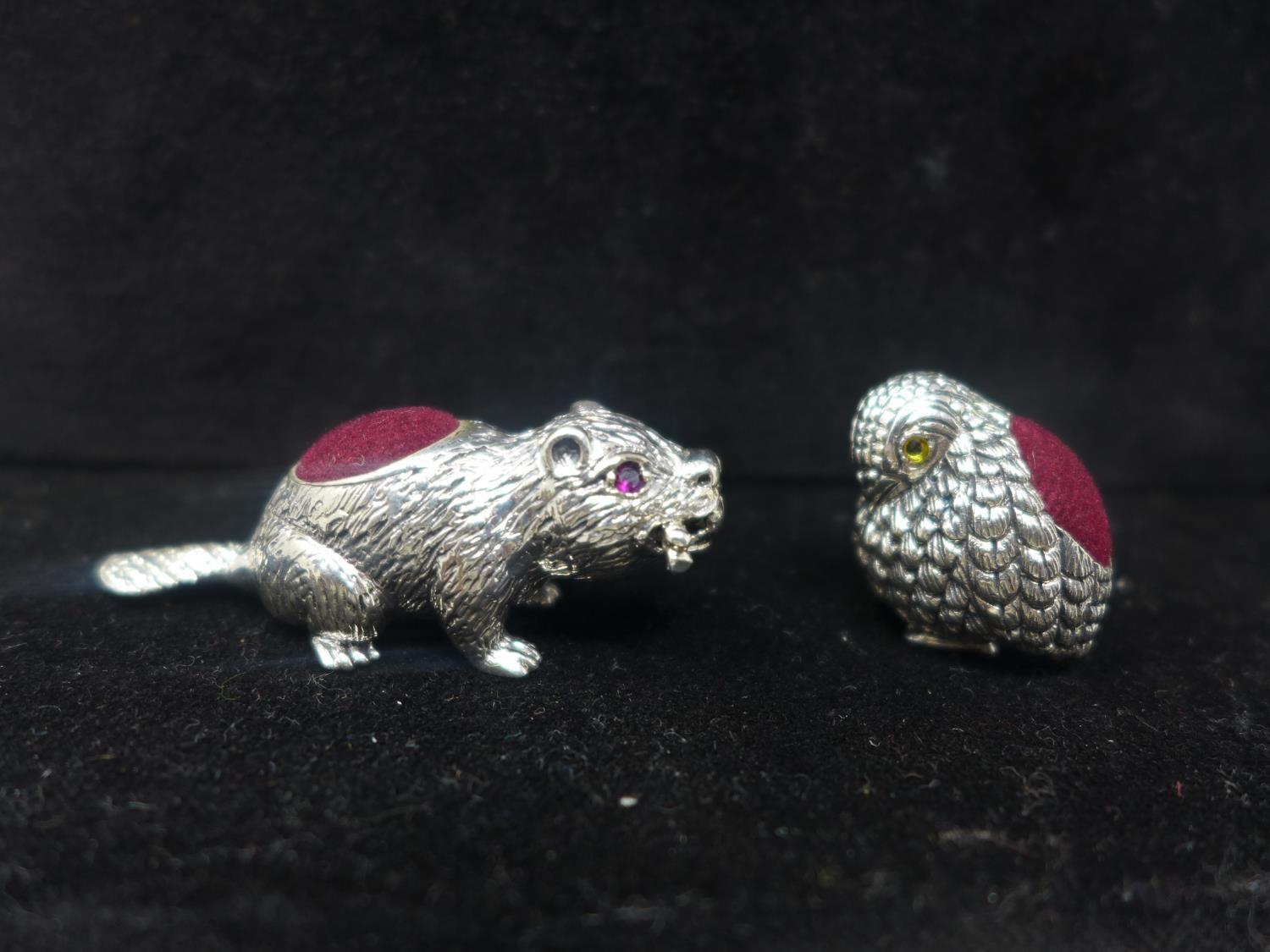 Two sterling silver pincushions in the form of a chick 2 x 1.5cm and a beaver with ruby eyes, Gross: