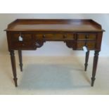 A Regency mahogany writing table, with 4 drawers, raised on turned legs, H.83 W.113 D.51cm