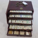 A 19th century Chinese Mahjong set, the hardwood and brass mounted travelling case having five