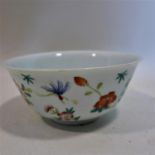 A 19th century Chinese porcelain bowl, decorated with insects and flowers, interior decorated with
