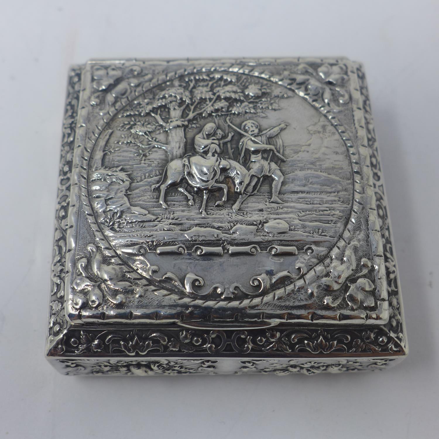A French silver snuff box, with repousse embossed decoration with vignette of scene from Exodus of - Image 2 of 4