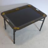 A Toleware tray on stand, H.44 W.75 D.56cm