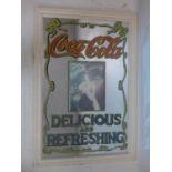 A Coca-Cola advertising mirror, 96 x 66cm