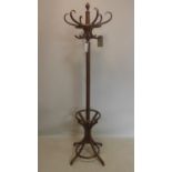 A bent wood coat and hat stand, H.186cm