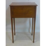 An Edwardian inlaid mahogany sewing table, raised on tapered legs and spade feet, H.73 W.46 D.
