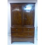 A 19th century mahogany linen press converted to wardrobe, H.210 W.122 D.58cm