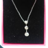 WITHDRAWN - A boxed 18ct white gold pendant on chain