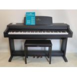 A Yamaha Clavinova CLP-411 digital piano, with stool, H.85 W.140 D.53cm