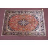 A Central Persian Kashan rug, central double pendent medallion with repeating petal motifs on a