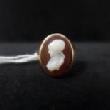 An antique gold and carved high figured cameo signet ring