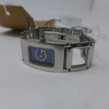 A boxed, Givenchy, Paris ladies wristwatch in stainless steel with rectangular dark blue dial, Swiss