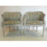 A pair of Louis XVI style tub chairs, with embossed floral damask upholstery