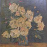 A 20th century, framed oil on canvas depicting a still life of a jug of white roses on a mossy green