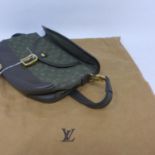 A dark green leather and monogrammed fabric handbag by Louis Vuitton H: 17 x W: 26 x D: 4cm, with LV