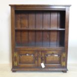 An early 20th century oak bookcase, H.96 W.84 D.26cm