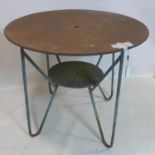 A vintage French wrought iron garden table, raised on hair pin legs, H.80 D.94cm