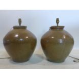 A pair of glazed stoneware table lamps, H.33cm