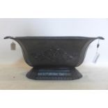 A 19th century black painted cast metal trough, with floral rim and base, H.26 W.66 D.35cm