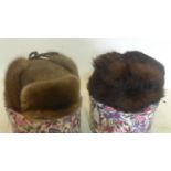 A gentleman's fur hat by Wegener, together with a ladies faux fur hat, both in individual hat