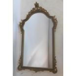 A Rococo style gilt pier mirror with shell finial, 104 x 61cm