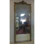 A tall ornate silvered mirror with bevelled plate, 208 x 90cm