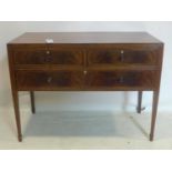 An Edwardian inlaid mahogany chest of 3 drawers, with ivory escutcheons, raised o tapered legs and