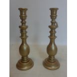 A pair of gilt wood candle stick holders, H.50cm