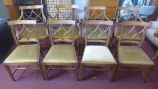 A set of 8 19th century inlaid elm wood dining chairs, to include 2 carvers, on reeded tapered